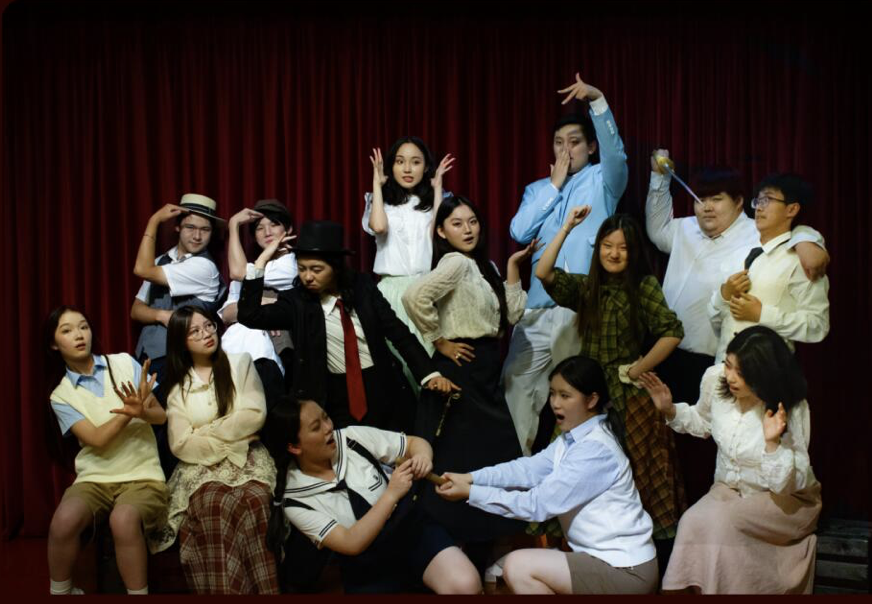 Drama cast on stage